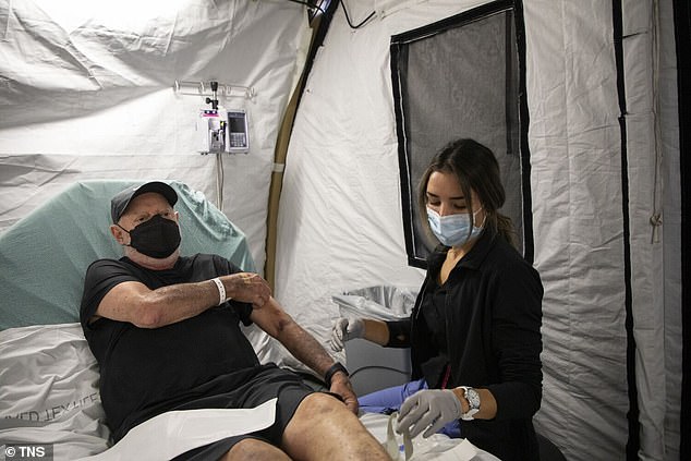 California hospitals use tents to treat overflow of flu cases as positive tests are up 259 PERCENT