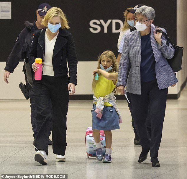 Cate Blanchett is seen boarding a flight to Adelaide with Foreign Affairs Minister Penny Wong