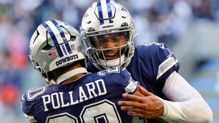 Dallas Cowboys quarterback Dak Prescott and running back Tony Pollard celebrate a touchdown