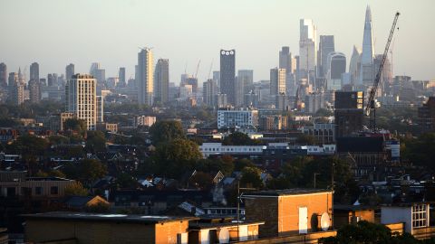 London's financial district can be seen in the distance beyond housing developments on October 8, 2022. 