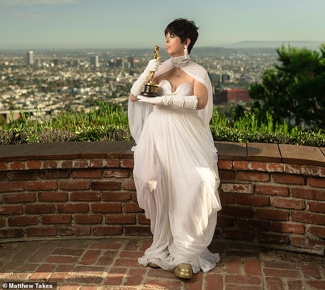 Diane Warren models a wedding gown for FINALLY getting her Oscar