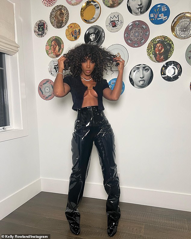 Kelly Rowland puts on a VERY busty display in tiny top and PVC pants