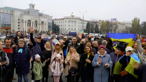 Crowds celebrate their city's liberation in Kherson, southern Ukraine, on Saturday, November 12, 2022. 