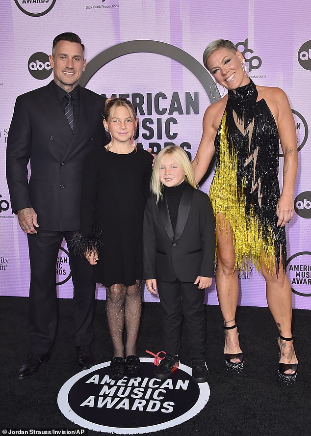 Pink stuns in dazzling black and yellow gown adorned with a lightning bolt to American Music Awards