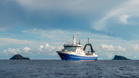 NIWA's research vessel set sail in April 2022 to uncover why the volcano erupted so violently. Here, it is flanked by the islands -- which used to be one -- that remain after the explosion: Hunga Ha'apai (left) and Hunga Tonga.