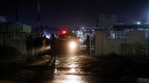 Iraqi security forces stand guard outside the hospital where the body of a U.S. citizen who was killed in Baghdad is being held, Iraq, November 7, 2022. REUTERS/Ahmed Saad