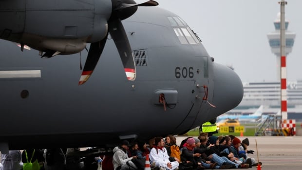 Climate activists stop private jets from leaving Amsterdam’s Schiphol Airport