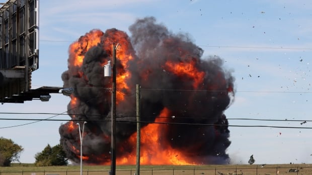 WW II-era planes collide mid-air at Dallas air show