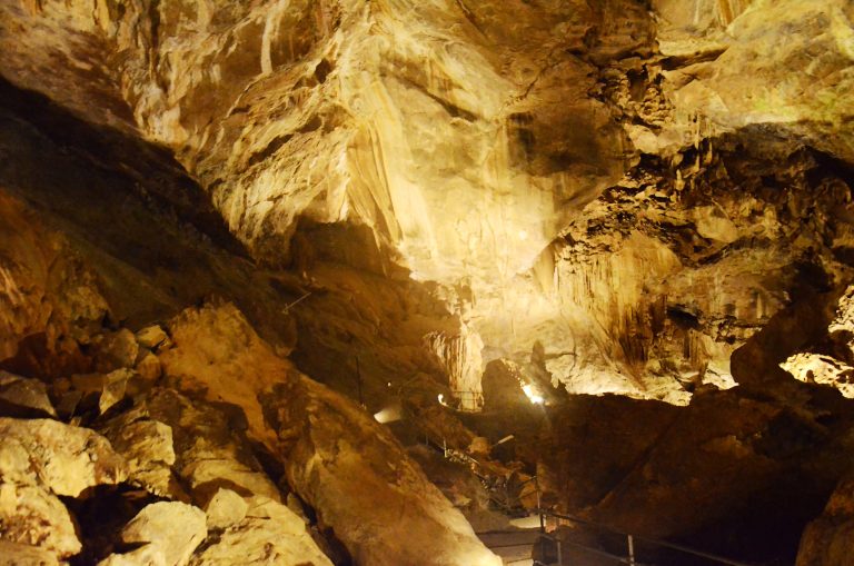 How can we make cave tourism more environmentally friendly?