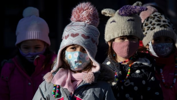 Wearing masks encouraged as hospitals struggle with virus surges, says Canada’s top doctor