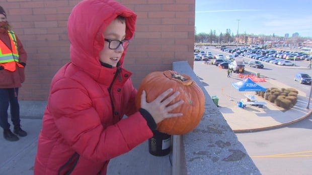 Smashing pumpkins: Winnipeggers toss their Halloween gourds to help stem climate change