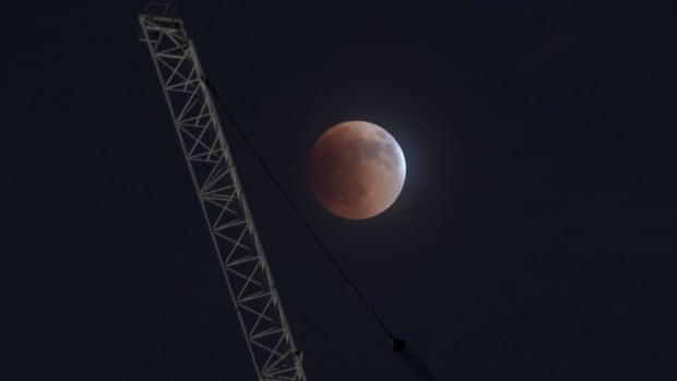 A total lunar eclipse happens early Tuesday morning. Here’s how to see it