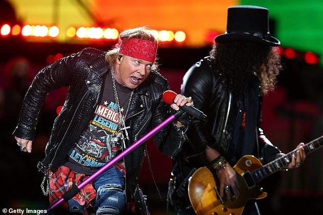 It comes after Gun N' Roses' show in Adelaide on Tuesday night ended in controversy after a concert goer was badly injured. Pictured: Axl Rose and Slash on stage during the Guns N' Roses 'Not In This Lifetime' Tour in 2017 in Perth