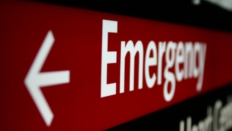 A sign with the word "emergency" written on it