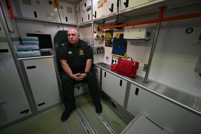 Paramedic Gary Clarke in an ambulance