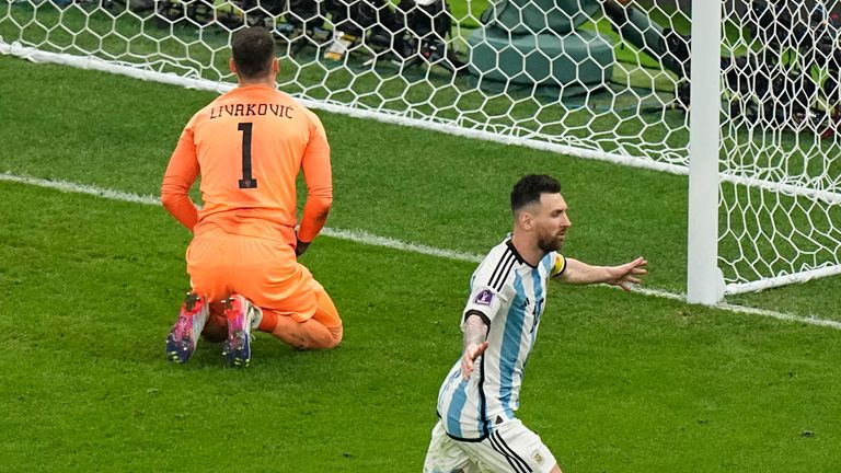 Lionel Messi celebrates after scoring his side&#39;s opening goal from penalty spot