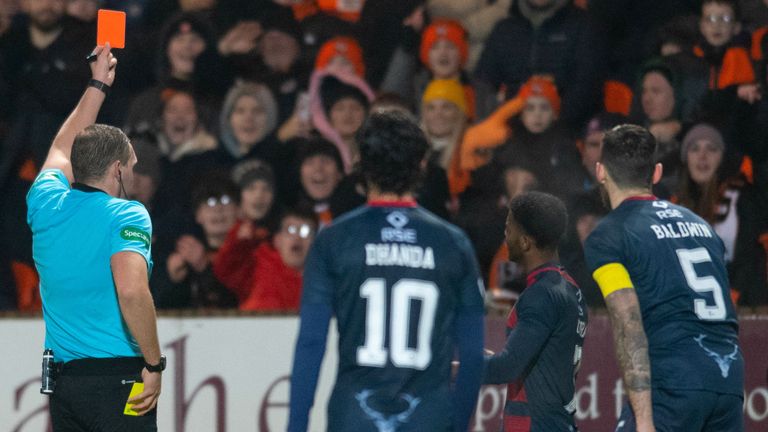 DUNDEE, SCOTLAND - DECEMBER 28: Ross County&#39;s Owura Edwards is shown a red card during a cinch Premiership match between Dundee United and Ross County at Tannadice Park, on December 28, 2022, in Dundee, Scotland.  (Photo by Mark Scates / SNS Group)