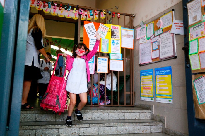 A girl coming out of school