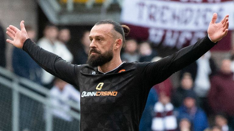 Dundee United&#39;s Steven Fletcher celebrates after scoring vs Hearts