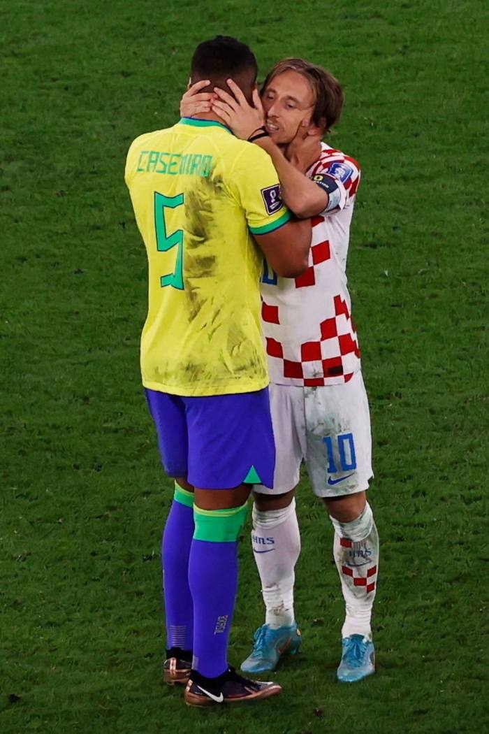 Modrić  and Casemiro after Brazil’s defeat by Croatia