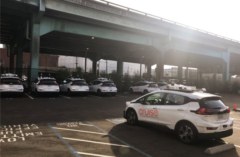 Autonomous cars in a parking lot.