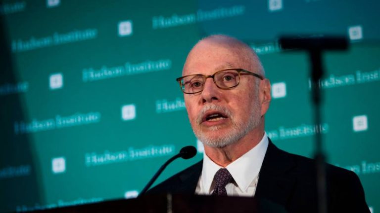 Elliott buys Nielsen debt, backing its own takeover