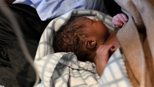 Libyan woman who gave birth aboard migrant rescue ship ‘doing well’: midwife