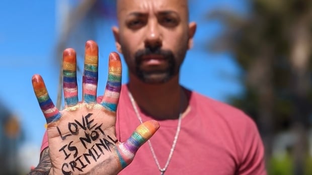 This man fled Qatar in fear of persecution because he’s gay. Now he’s pushing back