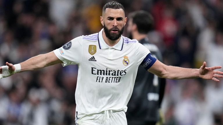 Real Madrid&#39;s Karim Benzema celebrates after scoring his sides first goal during the Champions League, round of 16, second leg soccer match between Real Madrid and Liverpool at the Santiago Bernabeu stadium in Madrid, Spain, Wednesday, March 15, 2023. (AP Photo/Bernat Armangue)