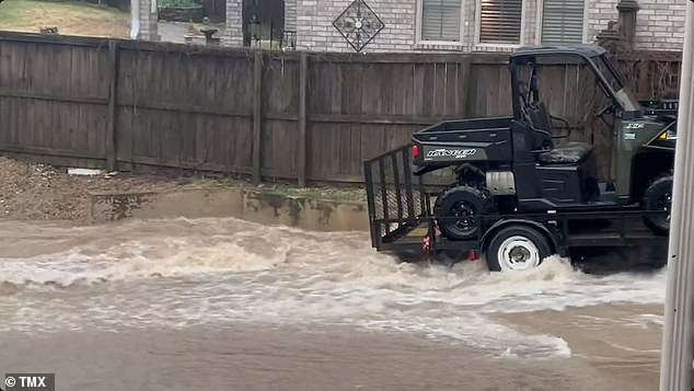 Backyards appeared more like lakes following the enormous downpours