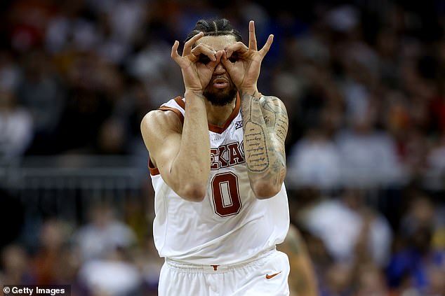 Timmy Allen #0 of the Texas Longhorns celebrates after scoring during the Sweet 16