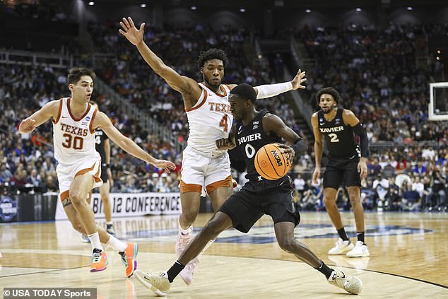 Hunter (4) defends against Xavier Musketeers guard Souley Boum (0) during the first half