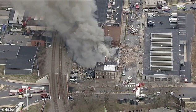 Large plumes of smoke rise from the destroyed factory. No one was evacuated before the explosion and police are still investigating