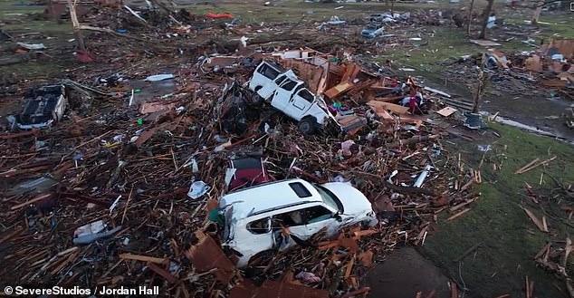 Aerial footage from Rolling Fork shows gutted homes, battered vehicles lodged among rubble and resident's belongings scattered across the wasteland