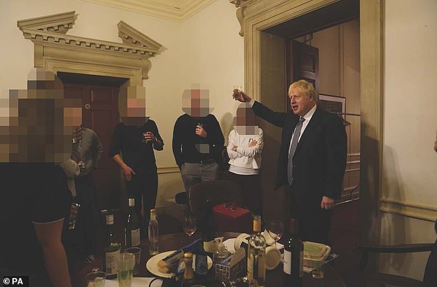 Handout file photo dated 13/11/20 issued by the House of Commons showing the then prime minister Boris Johnson (right) at a leaving gathering in the vestibule of the Press Office of 10 Downing Street, London, when rules were in force for the prevention of the spread of Covid