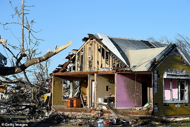 The series of two dozen tornadoes that struck the area caused catastrophic damage and have killed 26 people and injured countless others