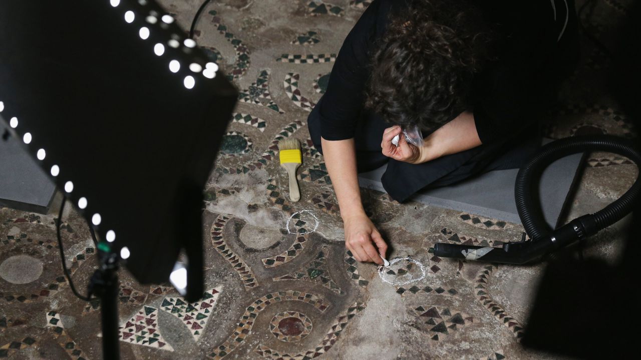 Conservation staff at Westminster Abbey mark the Cosmati pavement with chalk to assess it for conservation on September 24, 2012.