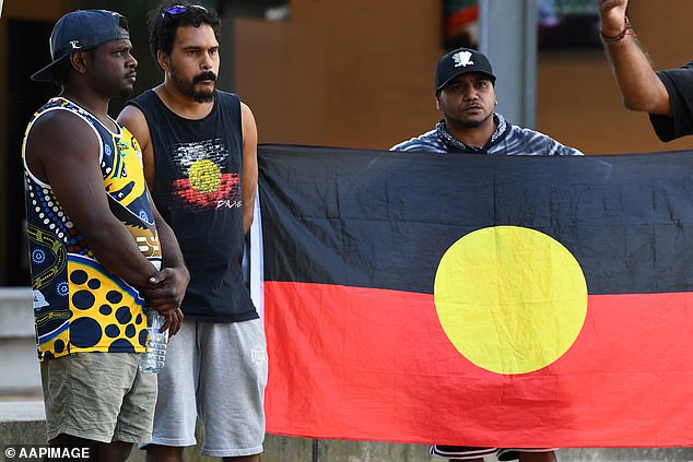 Footage from other police officers at the scene will be used in a coronial inquiry, while an investigation is also being conducted by independent officers from the Ethical Standards Command (pictured, protesters)