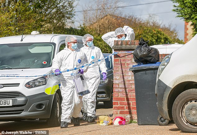 Police at the scene where Gary Dunmore was found dead. At 9.37pm, police were called by a person in Sutton, near Ely, also reporting hearing gunshots