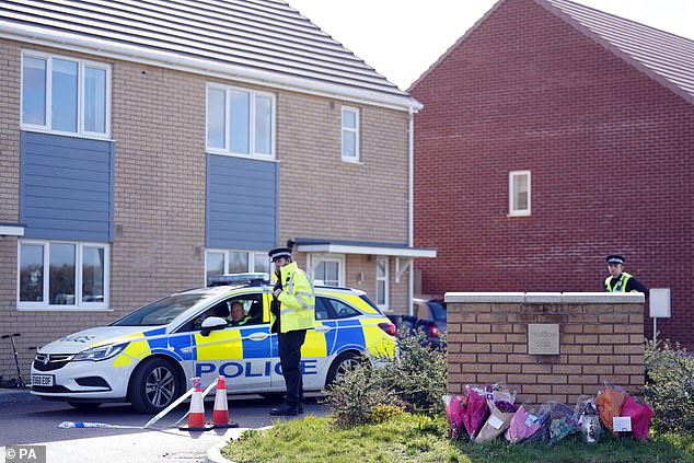 Devastated friends and family have laid flowers at the scene in Meridian Close, Bluntisham, where Josh Dunmore was found dead