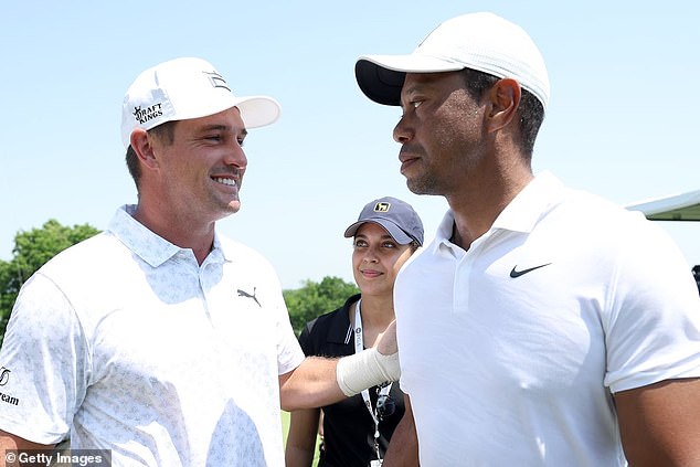 Bryson DeChambeau (left) has claimed old friend Tiger Woods (right) has frozen him out