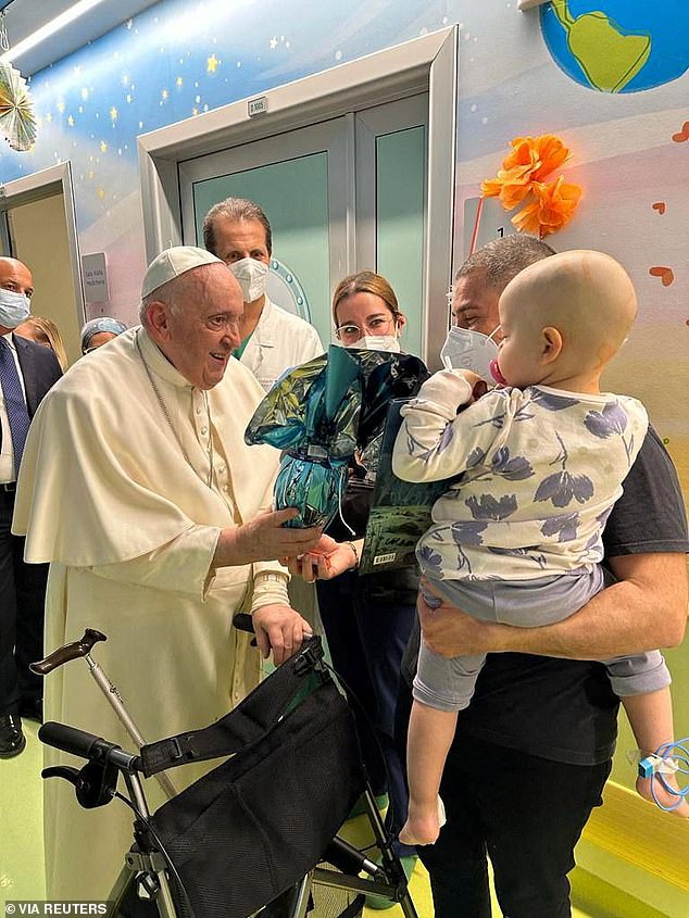 The Pope also visited a children's cancer ward at the Gemelli Hospital where he handed babies Easter eggs