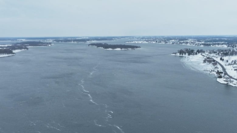 The St. Lawrence River flowing east past Cornwall Island. 