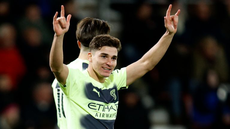 Julian Alvarez celebrates Man City&#39;s fourth goal after his shot deflects in off Chris Mepham