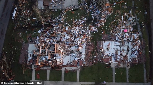 A vicious storm system spawning 24 twisters that ravaged Mississippi has torn apart a small rural town in the state with drone footage revealing the breadth of the devastation