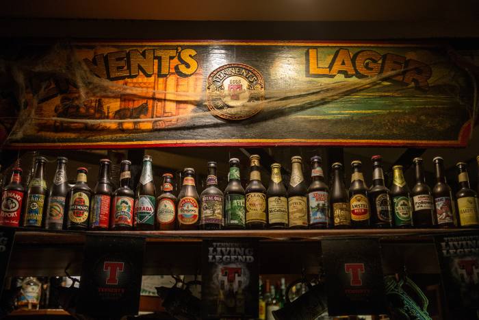 Tennent’s Pub in Rome is decorated with vintage wall hangings