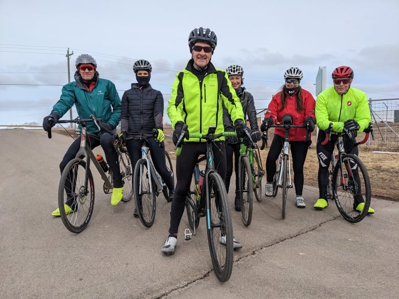 A group of cyclists on outdoor bikes 