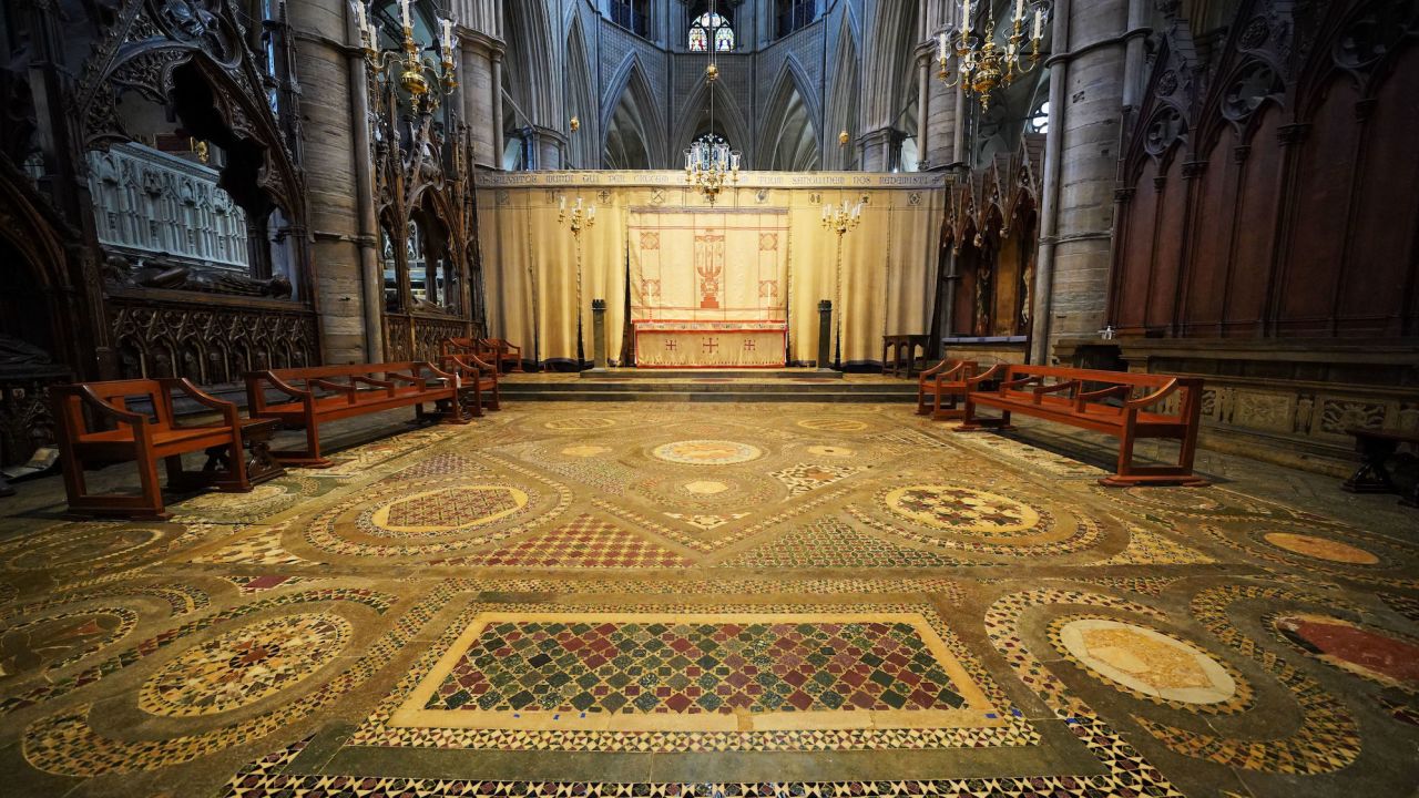 The Cosmati pavement is located in front of the High Altar at Westminster Abbey.