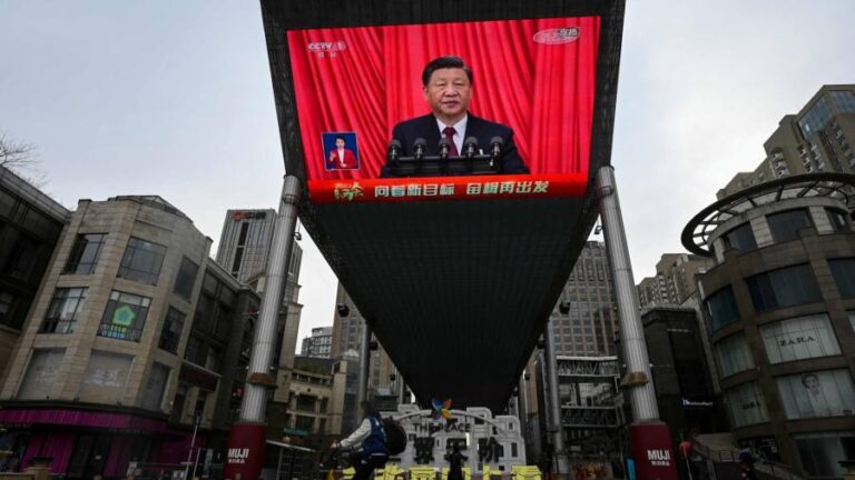 Xi tightens control with party overhaul of China government