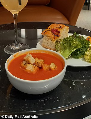 The food at the Heathrow lounge includes a buffet with dishes like a homemade tomato soup, steamed broccoli and focaccia (pictured, left), as well as a full sit-down restaurant